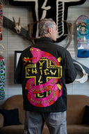 Vue arrière du Coach jacket snake cross avec motif serpent et croix